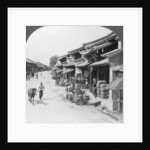 Main business street of the Chinese quarter, Bhamo, Burma by Stereo Travel Co