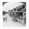 Main business street of the Chinese quarter, Bhamo, Burma by Stereo Travel Co