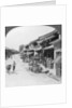 Main business street of the Chinese quarter, Bhamo, Burma by Stereo Travel Co