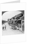 Main business street of the Chinese quarter, Bhamo, Burma by Stereo Travel Co