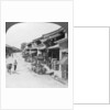 Main business street of the Chinese quarter, Bhamo, Burma by Stereo Travel Co