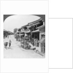 Main business street of the Chinese quarter, Bhamo, Burma by Stereo Travel Co