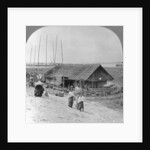 House built of bamboo on rafts, Bhamo, Burma by Stereo Travel Co