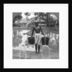 Watering cans used for street sprinkling, Burma by Stereo Travel Co