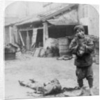 The grim executioner taking the labled head to exhibit a warning by Underwood & Underwood