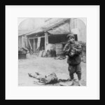 The grim executioner taking the labled head to exhibit a warning by Underwood & Underwood