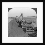 Conveying salt to the interior by wheelbarrow train by Keystone View Company