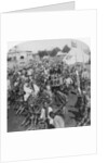 Wheelbarrow transportation at the boat landing by Underwood & Underwood