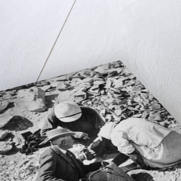 Sifting the dust from the floor of the Tomb of Tutankhamun by Harry Burton