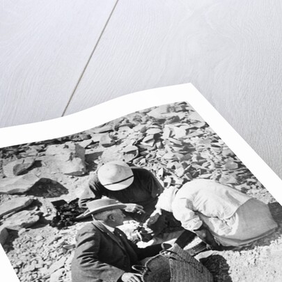 Sifting the dust from the floor of the Tomb of Tutankhamun by Harry Burton