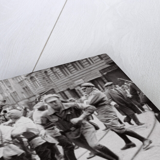 Men in Bolshevik uniform fighting police in the street by Anonymous