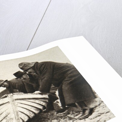 Hauling one of the 'Lusitania's' lifeboats onto the beach by Clarke & Hyde