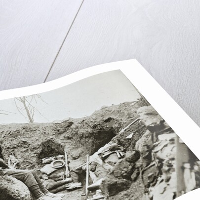 British troops resting in a captured German trench by Anonymous