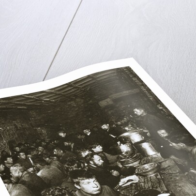 Russian manual labourers eating a meal by Anonymous