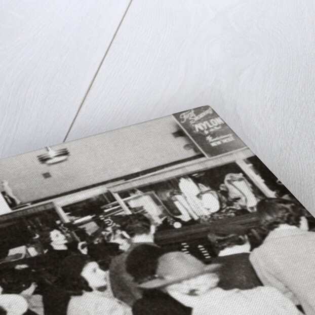 The first experimental sale of nylon stockings by Anonymous