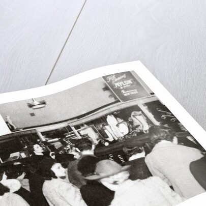 The first experimental sale of nylon stockings by Anonymous