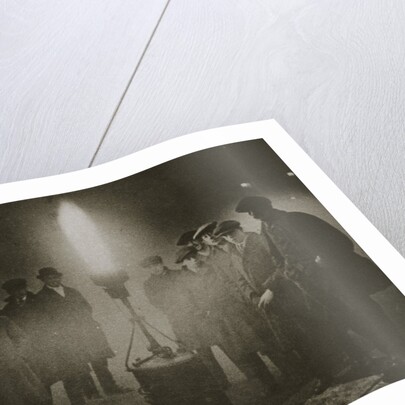 Gathering around an acetylene flare at a traffic control point in the fog by Anonymous