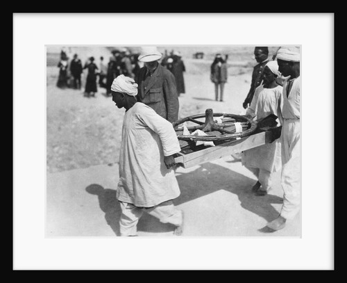 Removing a chariot wheel from the Tomb of Tutankhamun by Harry Burton