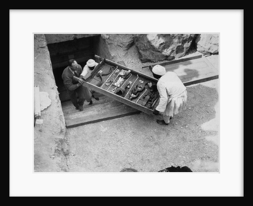 Removing a tray of chariot parts from the Tomb of Tutankhamun by Harry Burton