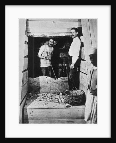 Howard Carter and a colleague excavating a tomb in the Valley of the Kings by Harry Burton