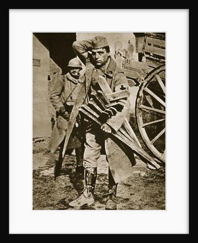 French soldier with wooden crosses to be placed on temporary graves by Anonymous