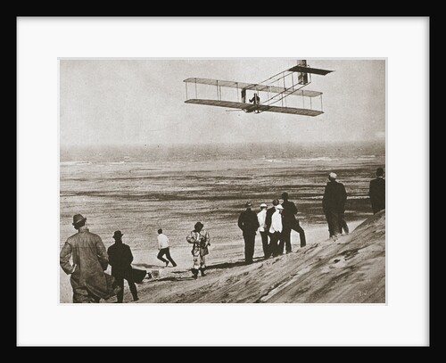 The Wright Brothers testing an early plane at Kitty Hawk by Anonymous