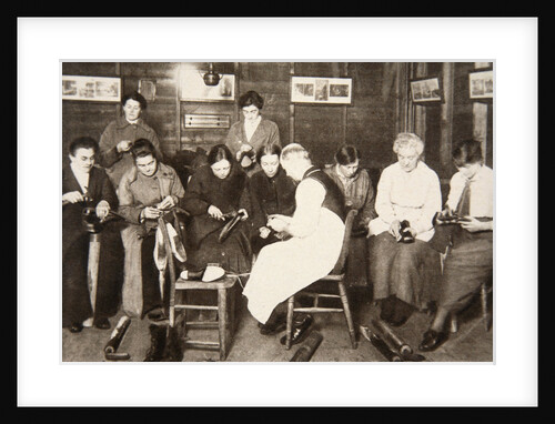 A group of women receive a lesson in boot repairing by S and G