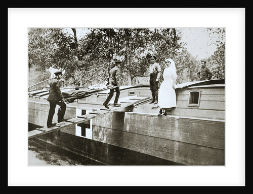 Patients being taken on board a hospital barge by Anonymous