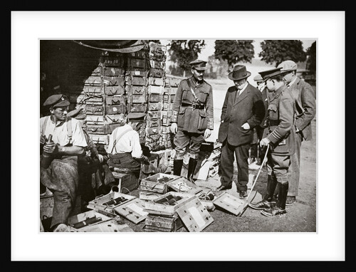 Mr Asquith watching men adjusting fuses by Anonymous