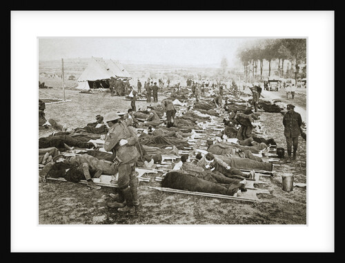 Wounded men waiting to be taken away to a clearing station by Anonymous