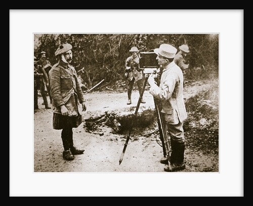Cameraman filming a wounded soldier by Anonymous