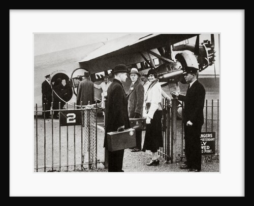 Ford Trimotor plane about to depart from an airfield by Anonymous