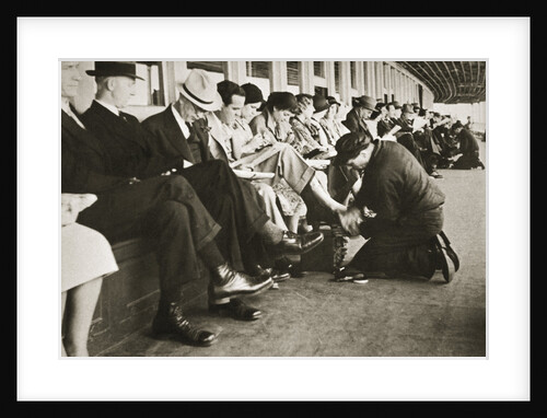 Shoe shiners working on board the Staten Island Ferry by Anonymous