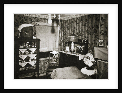 Room within a New York tenement block by Anonymous