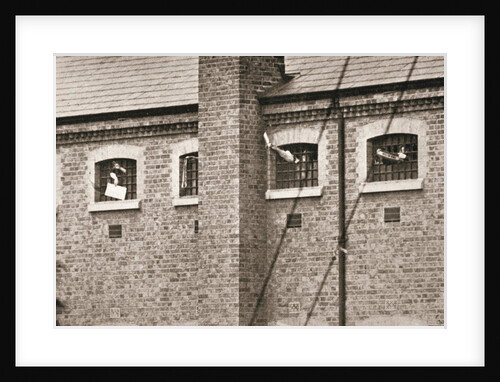 Hunger strikers waving to Christabel Pankhurst from their cells in Holloway Prison by Anonymous