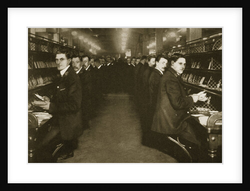 Staff sorting letters at the Post Office by Anonymous