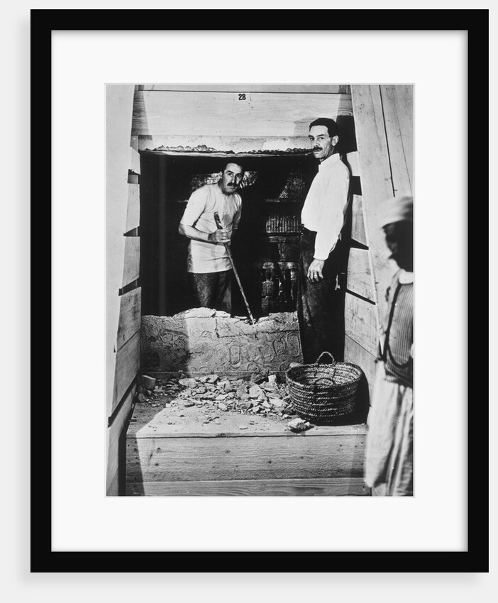 Howard Carter and a colleague excavating a tomb in the Valley of the Kings by Harry Burton