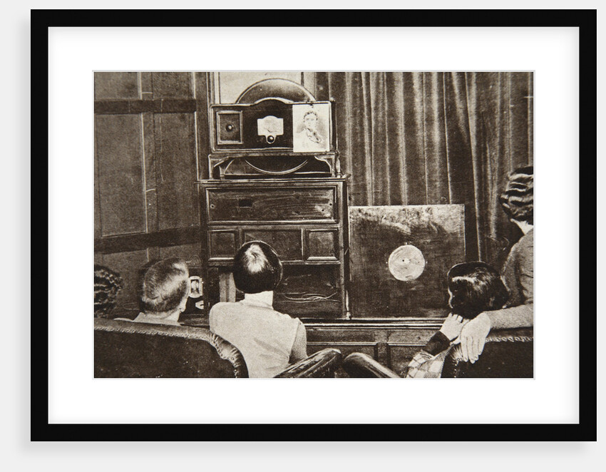 People watching an early television transmission by Anonymous