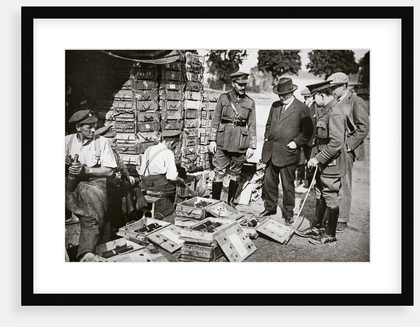 Mr Asquith watching men adjusting fuses by Anonymous