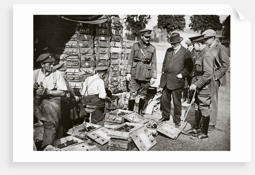Mr Asquith watching men adjusting fuses by Anonymous