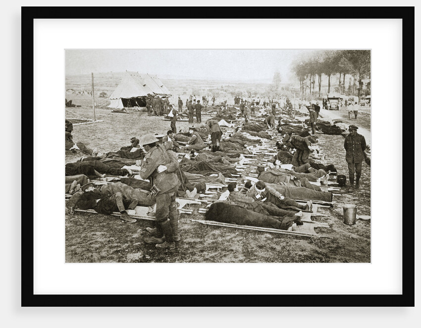Wounded men waiting to be taken away to a clearing station by Anonymous