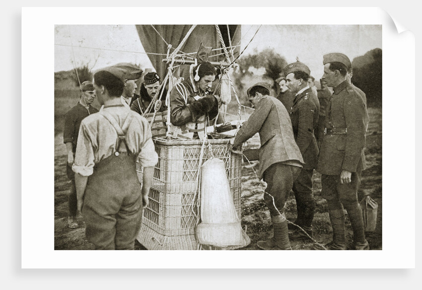 Observer of a kite-balloon testing the telephone before ascending by Anonymous