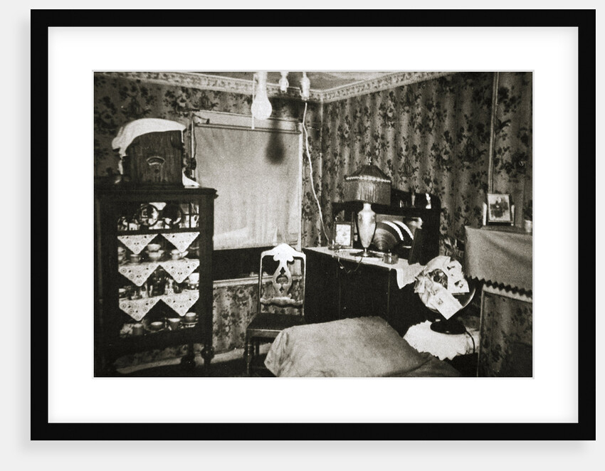 Room within a New York tenement block by Anonymous