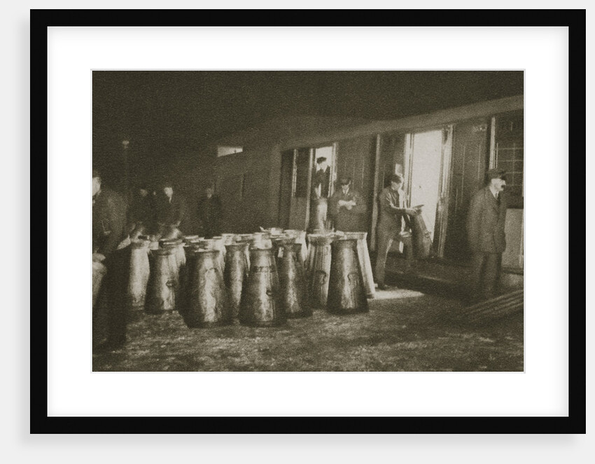 Unloading a milk train by Anonymous