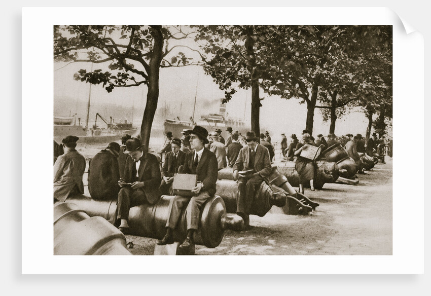 City workers lunching at Tower wharf, seated on old cannons by Anonymous