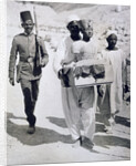 Mannequin or bust of Tutankhamun being carried from his tomb by Harry Burton