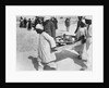 Removing a chariot wheel from the Tomb of Tutankhamun by Harry Burton