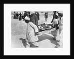 Removing a chariot wheel from the Tomb of Tutankhamun by Harry Burton