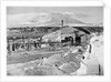In Winter Quarters Working on Maps and Records by Herbert Ponting