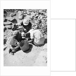 Sifting the dust from the floor of the Tomb of Tutankhamun by Harry Burton